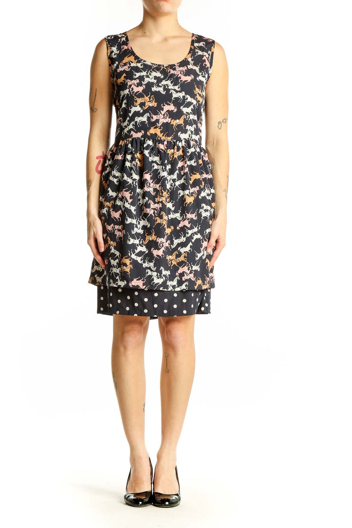 Front view of black Porridge dress with colorful horse print and polka dot hem