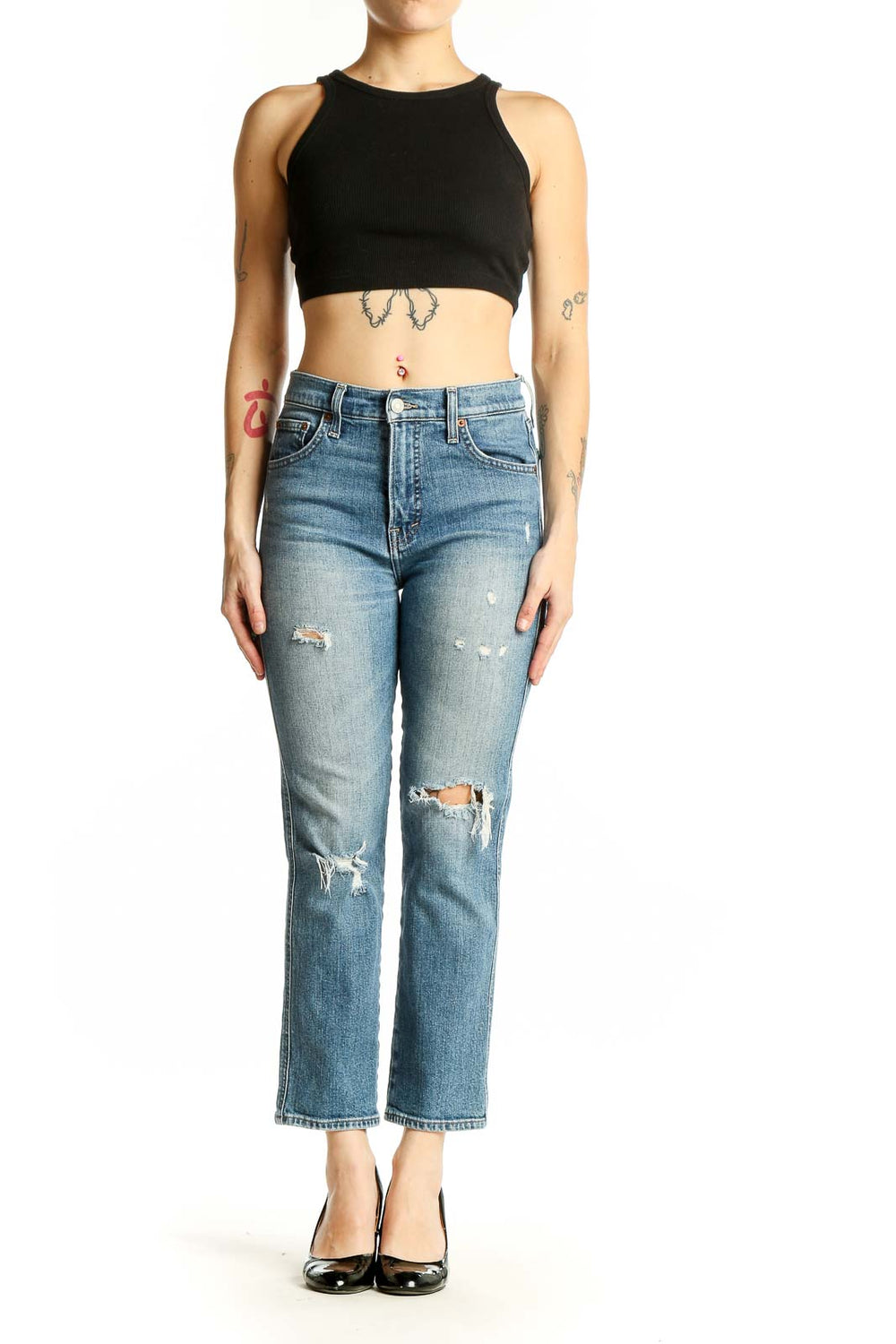 Front view of Lucky Brand light blue distressed cropped jeans on model