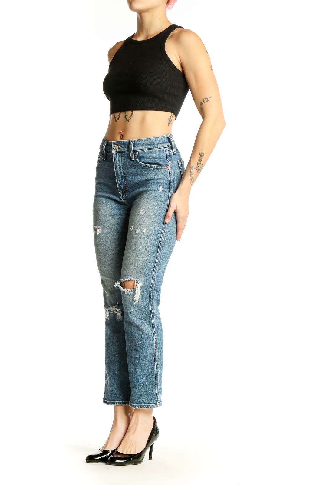 Front view of Lucky Brand light blue distressed cropped jeans on model