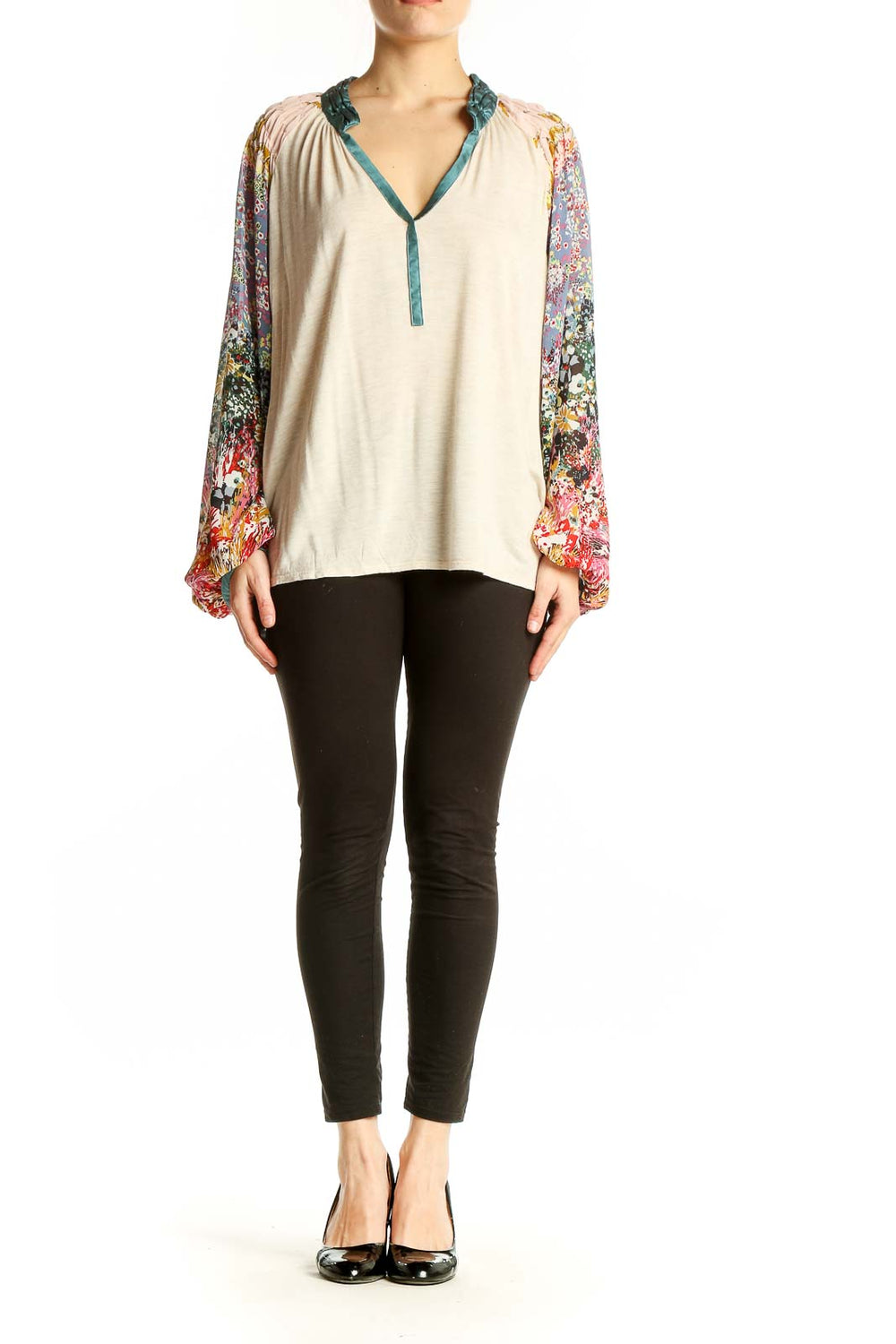 Front view of beige TINY peasant top with colorful floral print sleeves