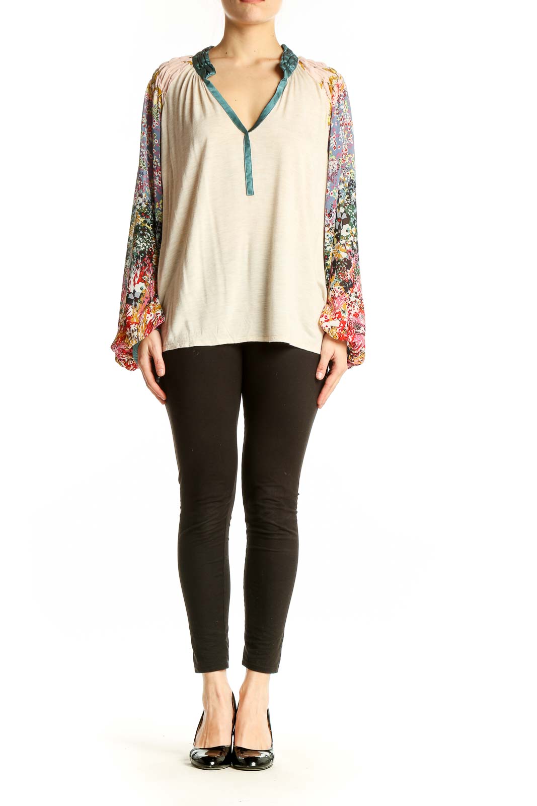 Front view of beige TINY peasant top with colorful floral print sleeves