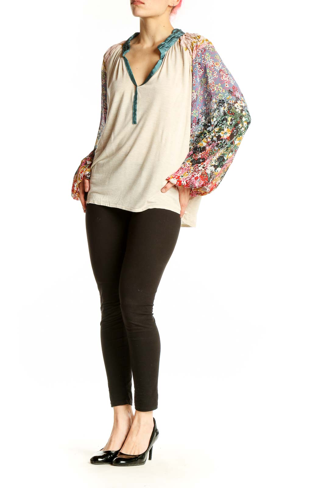 Front view of beige TINY peasant top with colorful floral print sleeves