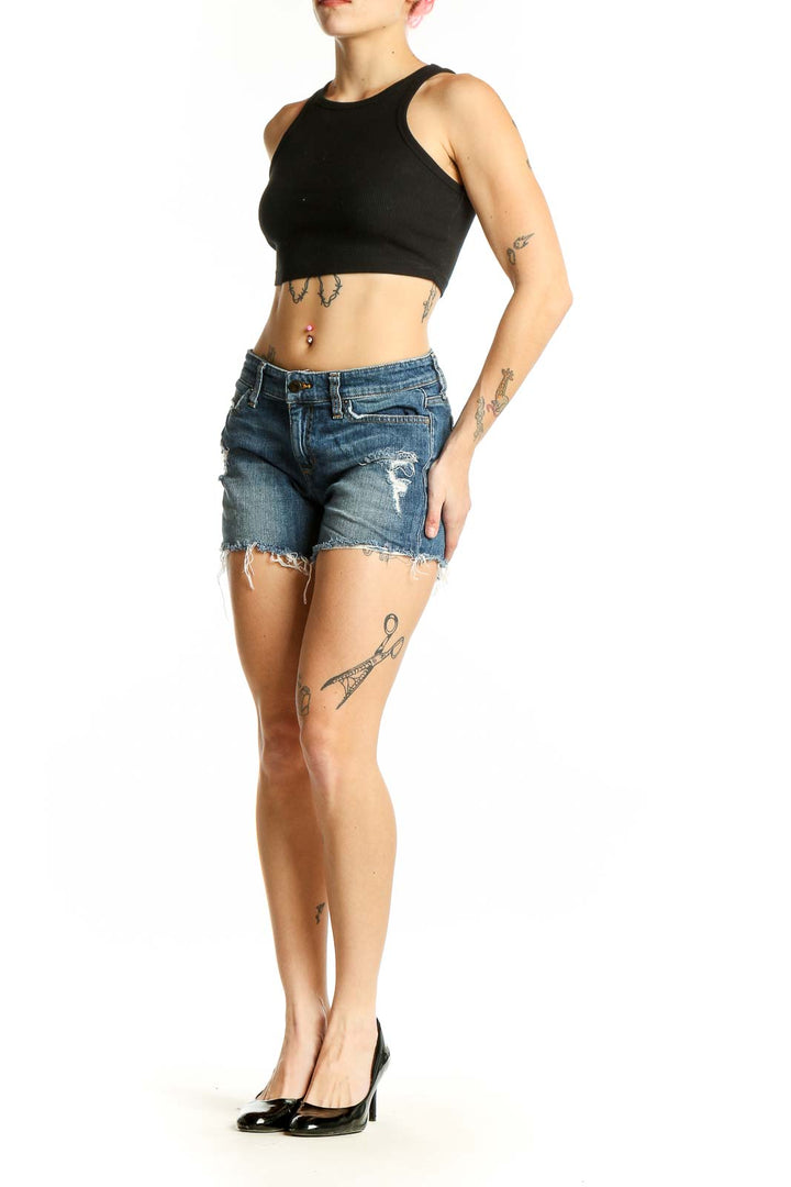 Front view of Joe's blue distressed denim cut-off shorts with raw hem