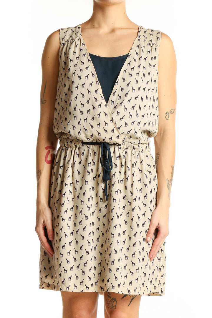 Front view of beige Promod sleeveless dress with giraffe print and wrap-style V-neck