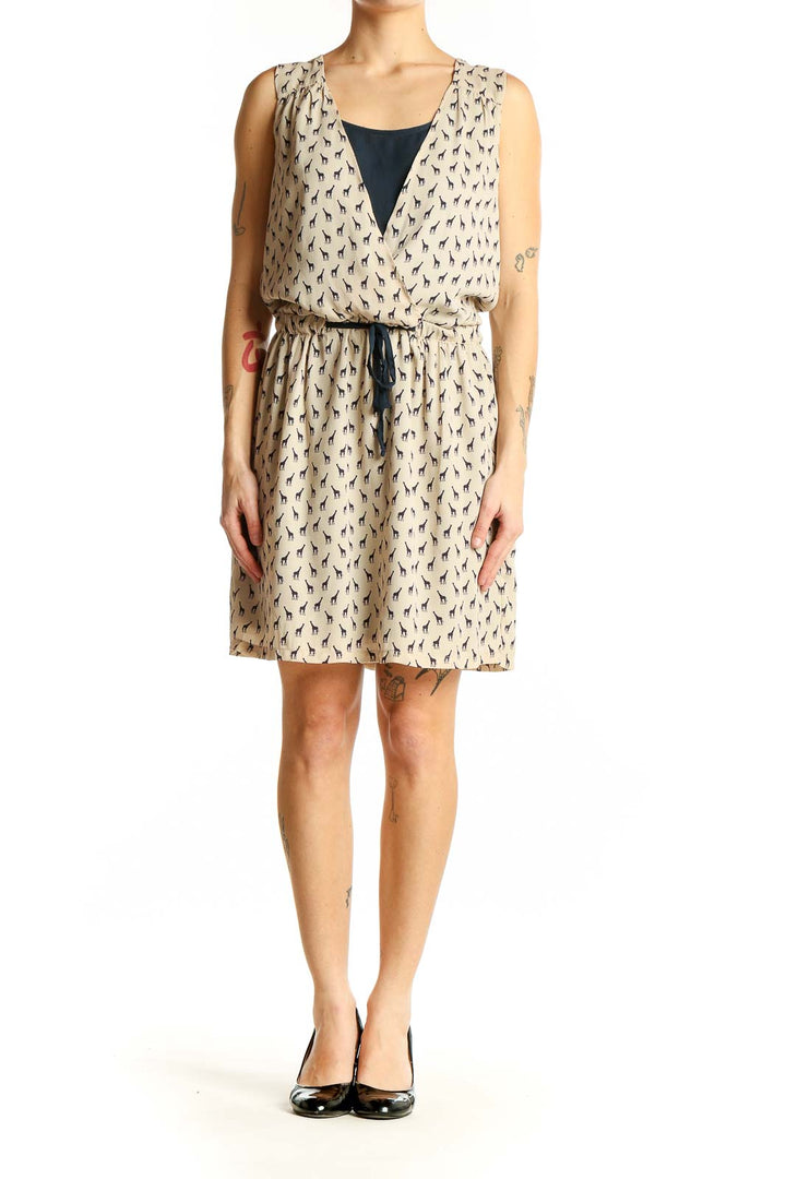 Front view of beige Promod sleeveless dress with giraffe print and wrap-style V-neck
