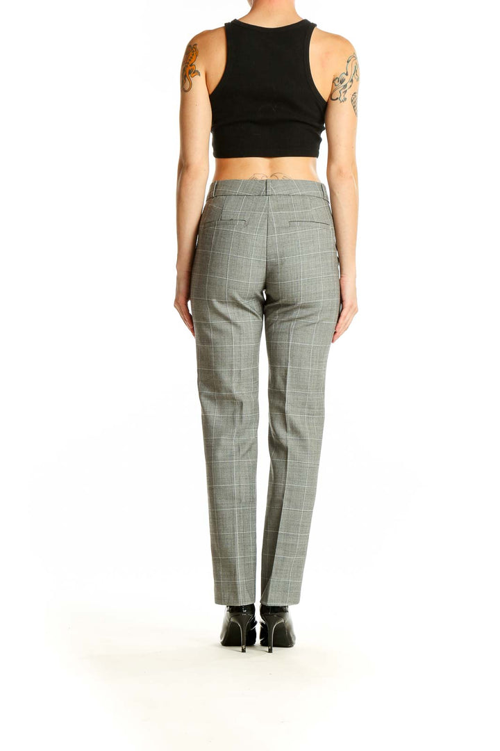 Back view of Banana Republic gray plaid wool-blend dress pants on model