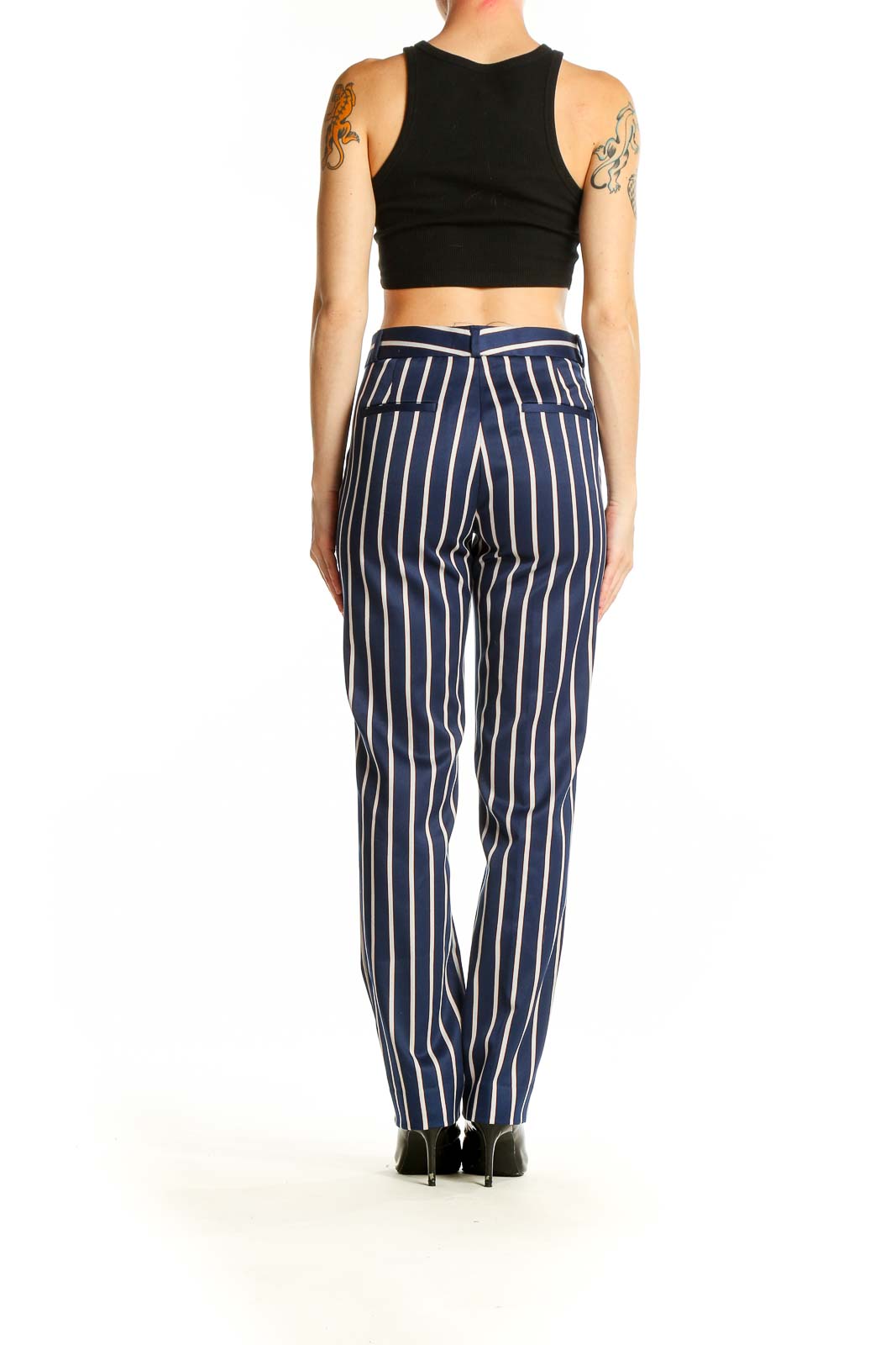 Side view of Banana Republic navy striped wide-leg trousers on model with black crop top