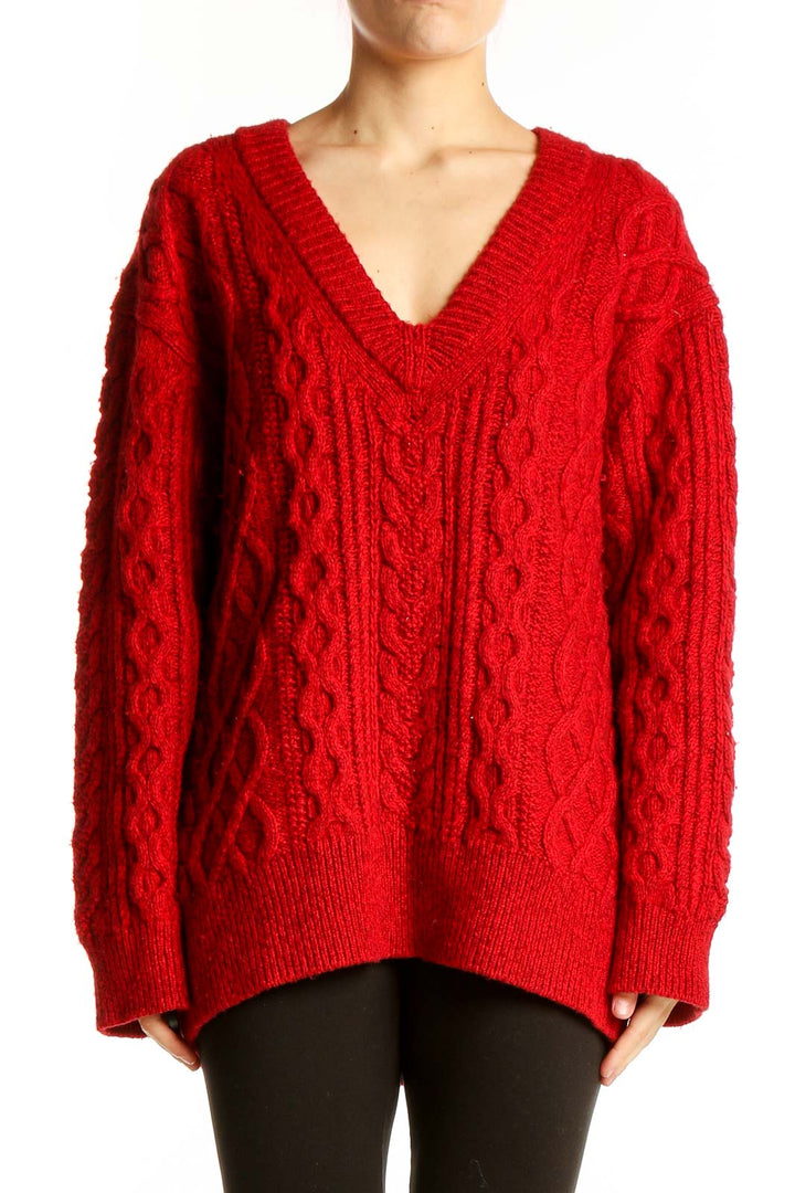 Front view of red cable knit V-neck sweater by Vince