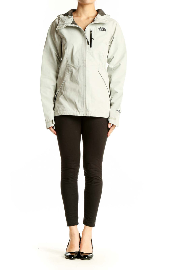 Front view of The North Face light gray hooded activewear jacket