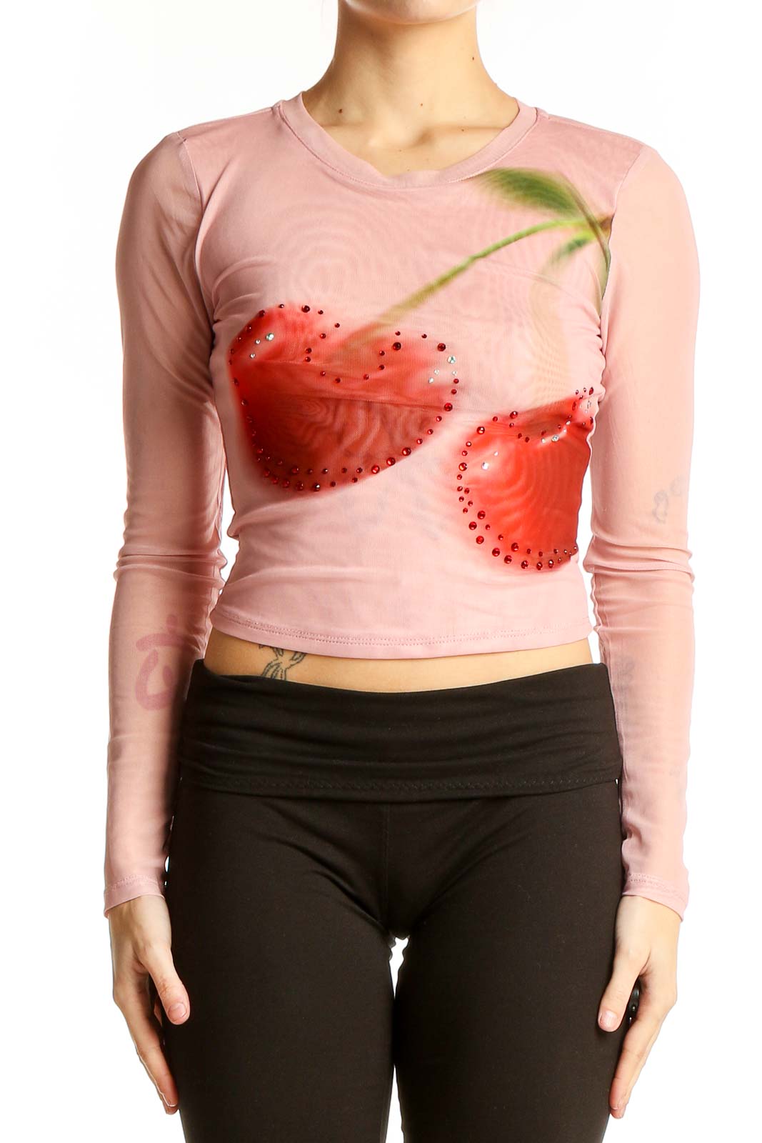Front view of Madden Girl pink crop top with rhinestone cherry print