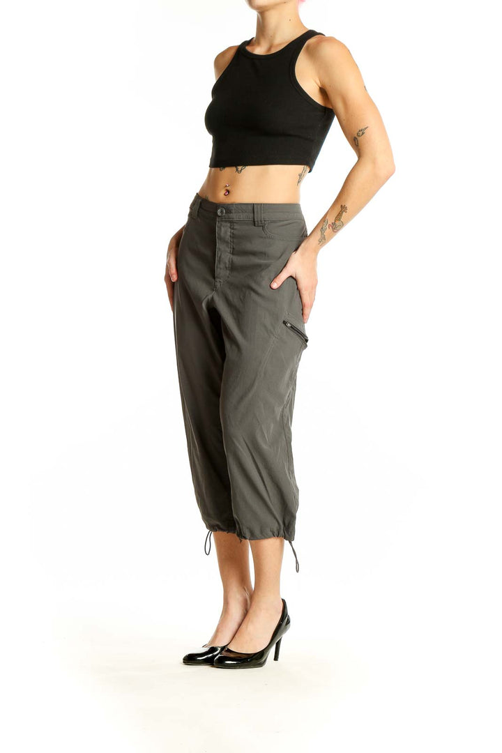 Front view of olive green Eddie Bauer capri pants with side pockets