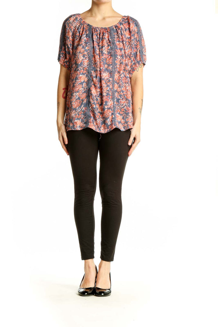 Front view of Adrienne Vittadini blue floral peasant blouse with scoop neckline