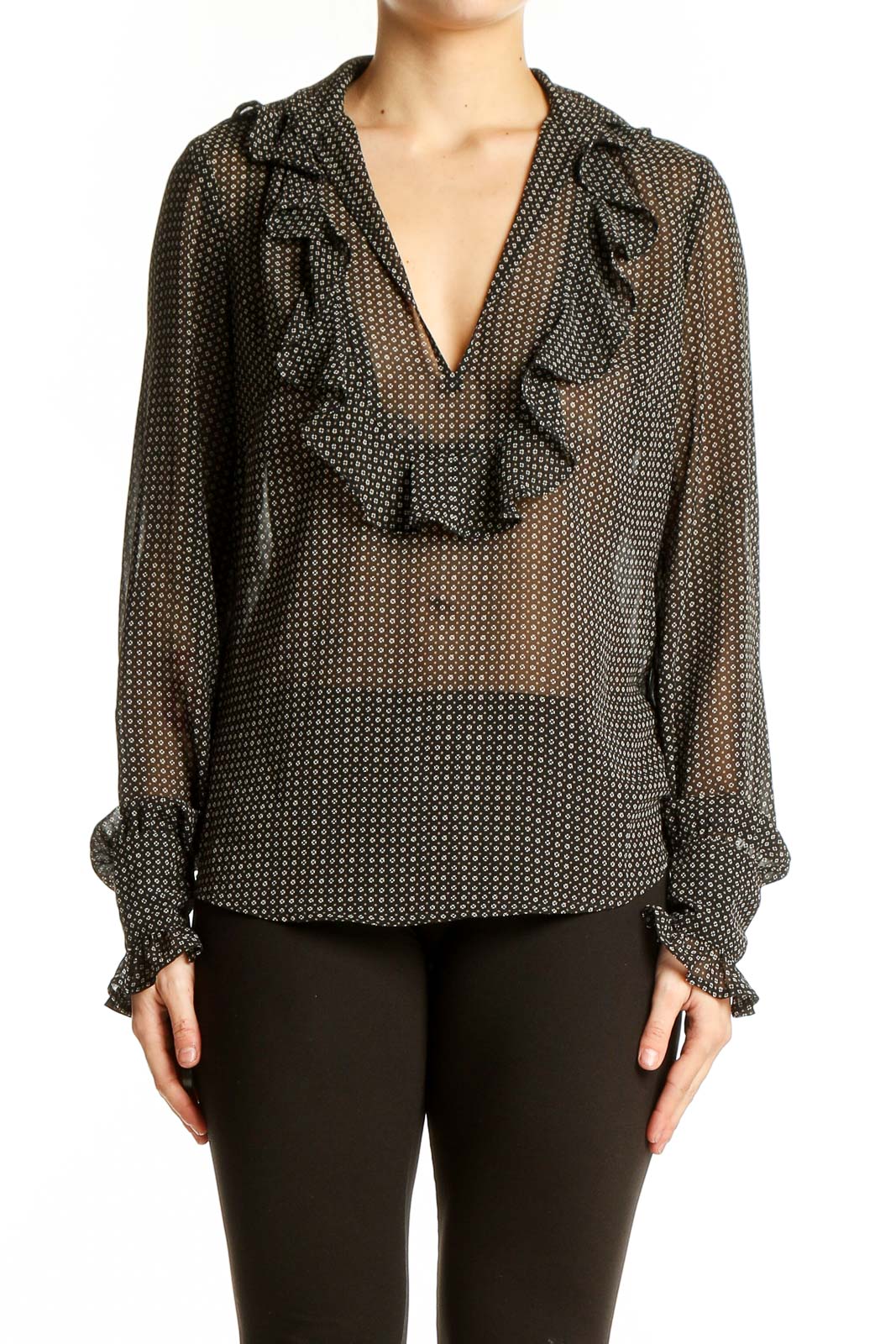 Front view of Ann Taylor LOFT black polka dot sheer blouse with ruffle detail