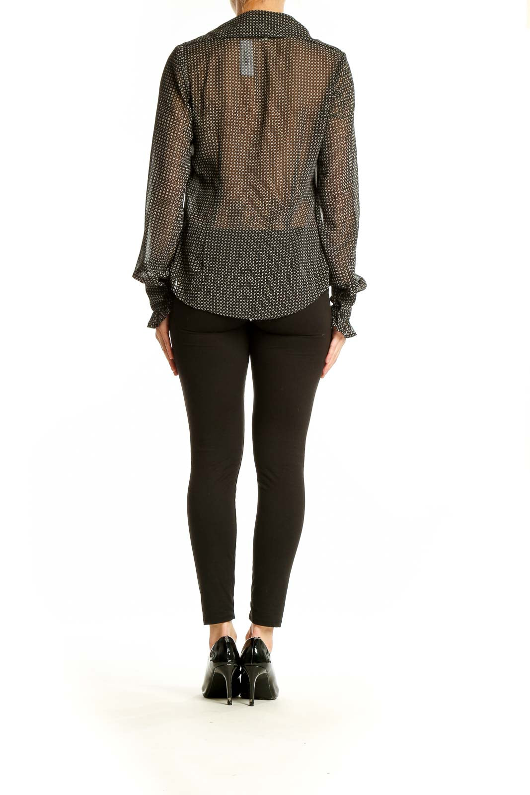 Back view of Ann Taylor LOFT black polka dot sheer blouse on model