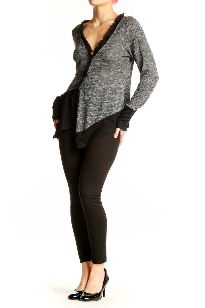 Front view of Meadow Rue gray asymmetrical wrap cardigan with frayed edges