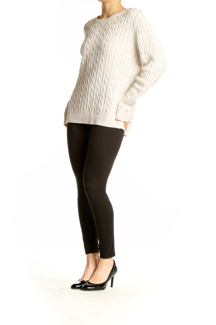 Front view of Croft & Barrow cream cable knit sweater on model
