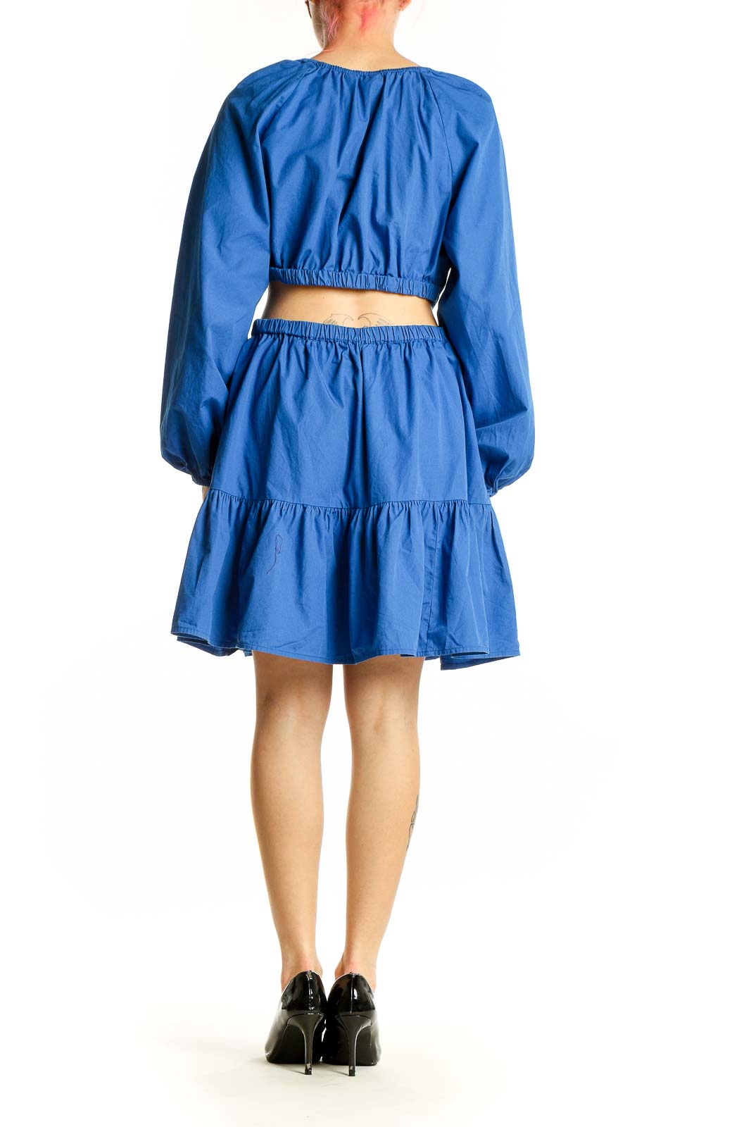 Side view of Gap blue cotton midi dress showing ruffle hem and cut-out detail