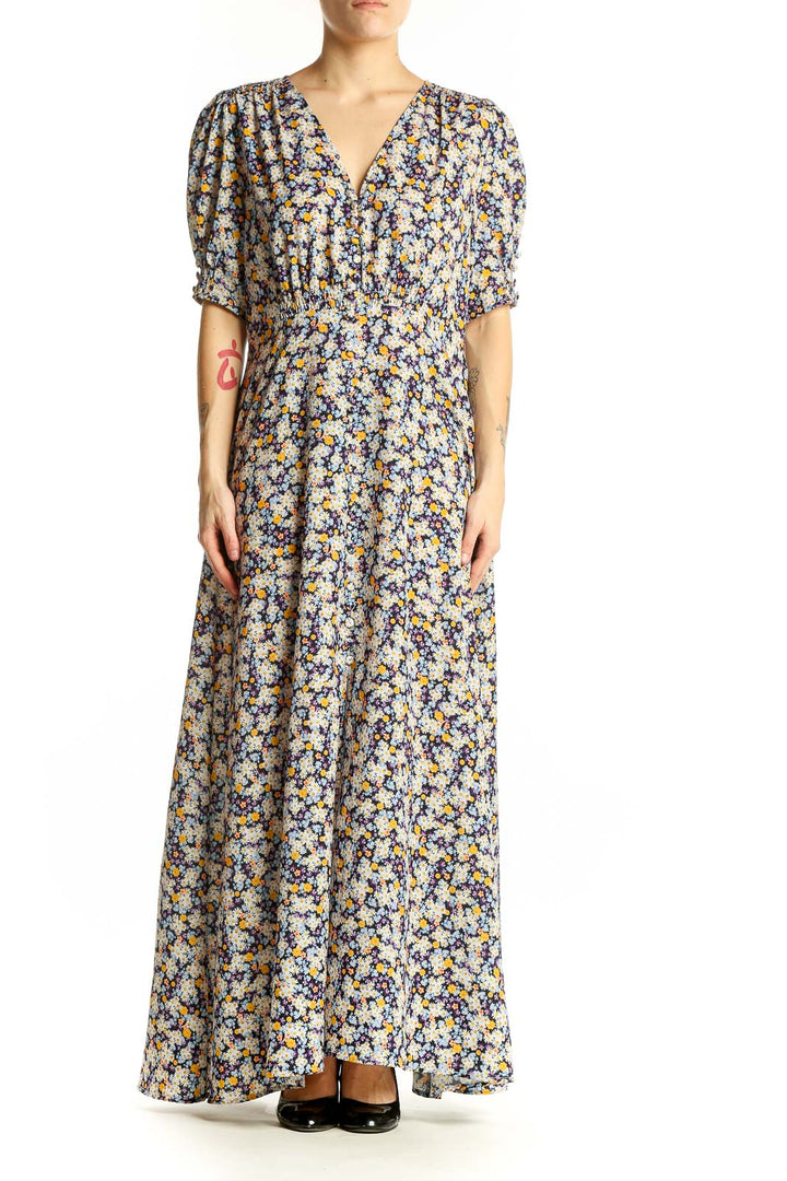 Front view of ROAM blue floral maxi dress with V-neck and puff sleeves