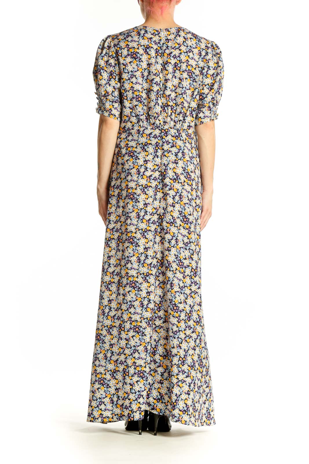 Side view of ROAM blue floral maxi dress showing flowing silhouette