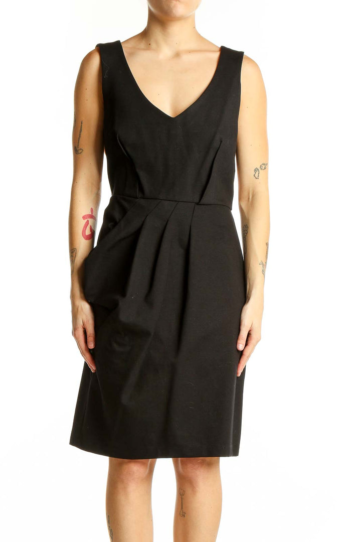 Front view of black Ali Ro cocktail dress with V-neck and pleated waist