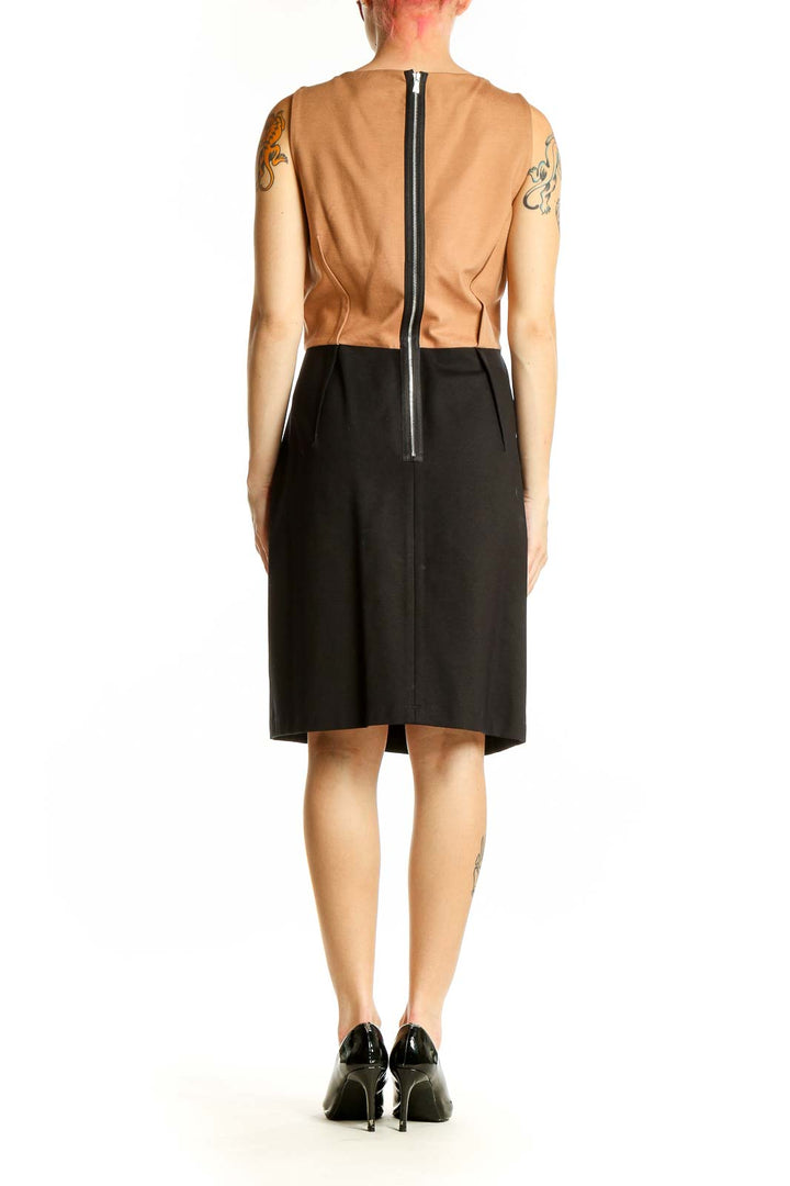 Side view of black Ali Ro cocktail dress showing sleeveless design