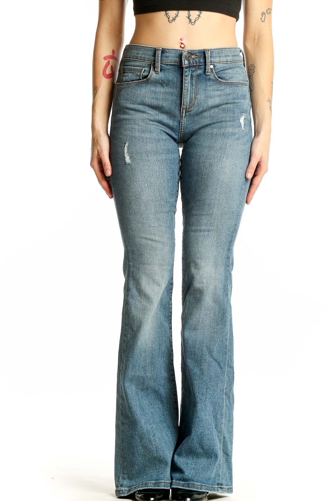 Front view of Banana Republic blue flare jeans with subtle distressing