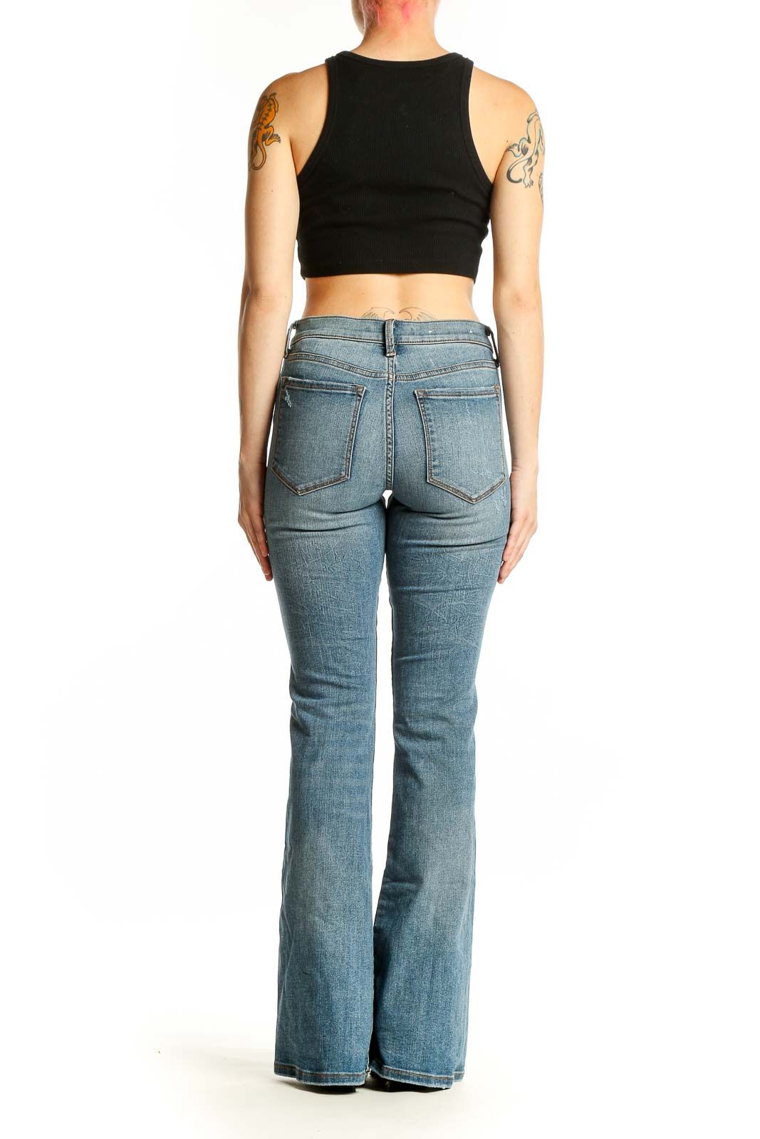 Back view of Banana Republic blue flare jeans on model