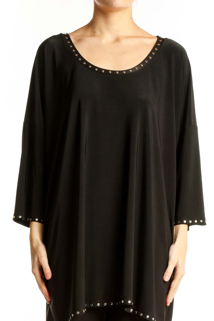 Front view of Isabella Rodriguez black oversized tunic top with studded trim