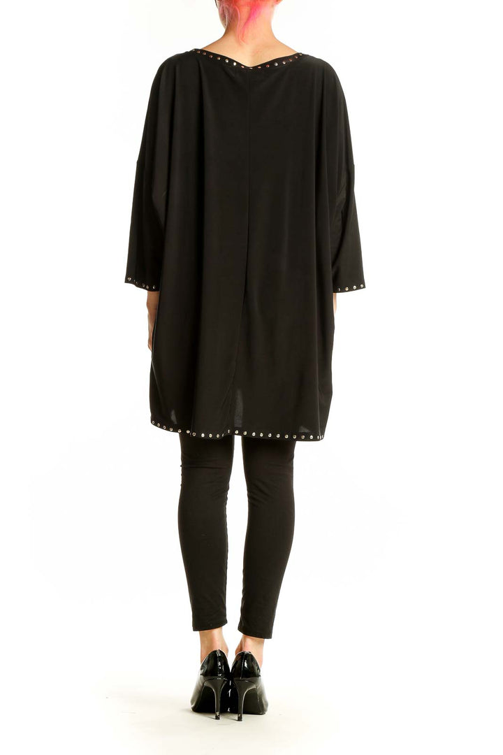 Back view of Isabella Rodriguez black oversized tunic top showing flowy silhouette