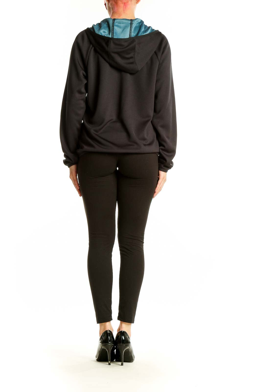 Back view of black Wrangler zip-up activewear hoodie on model