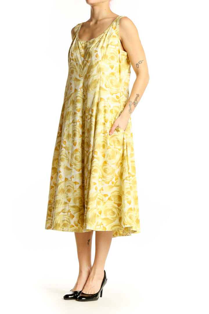Front view of Talbots yellow floral midi dress with A-line silhouette