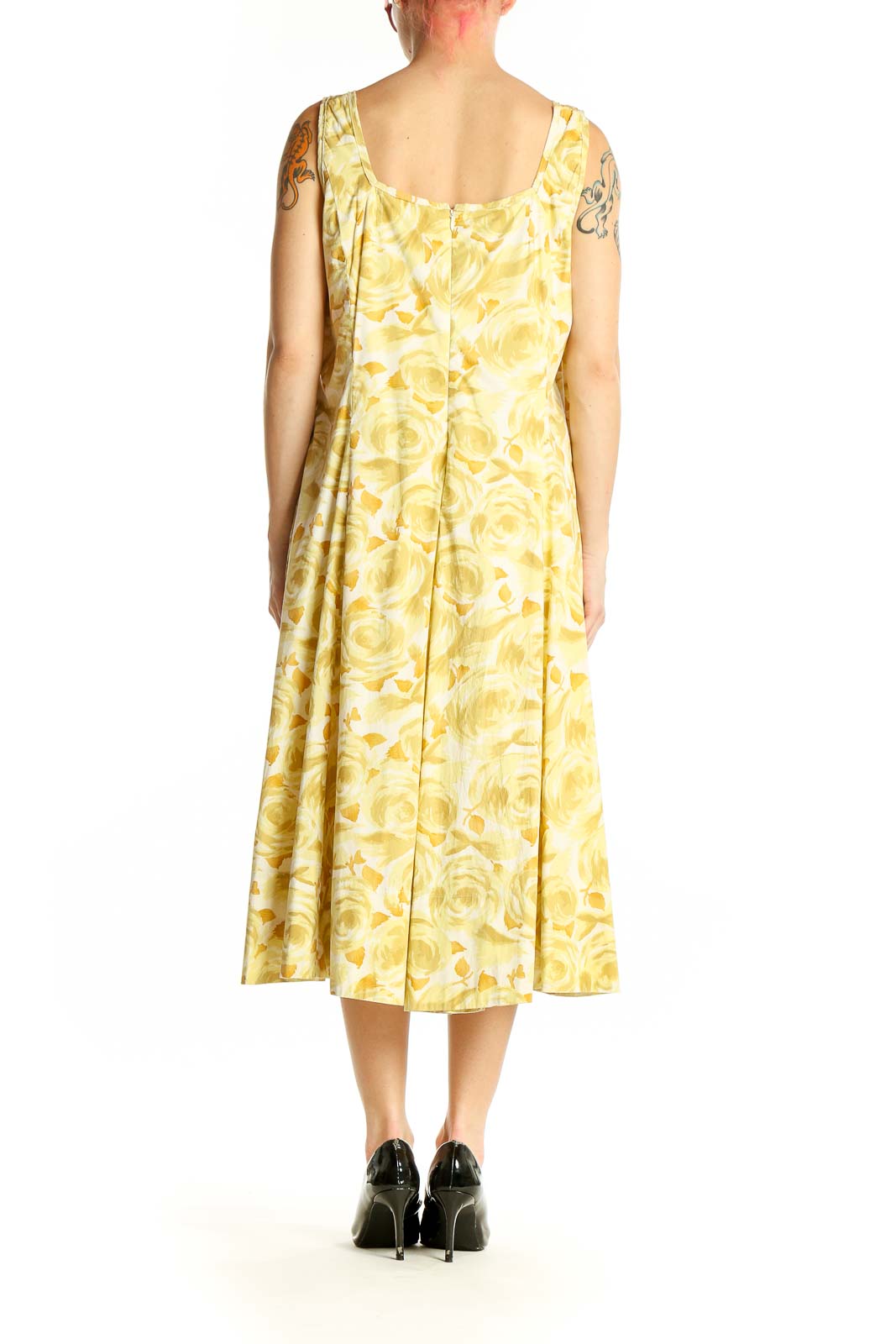 Side view of Talbots yellow floral midi dress showing flowing skirt