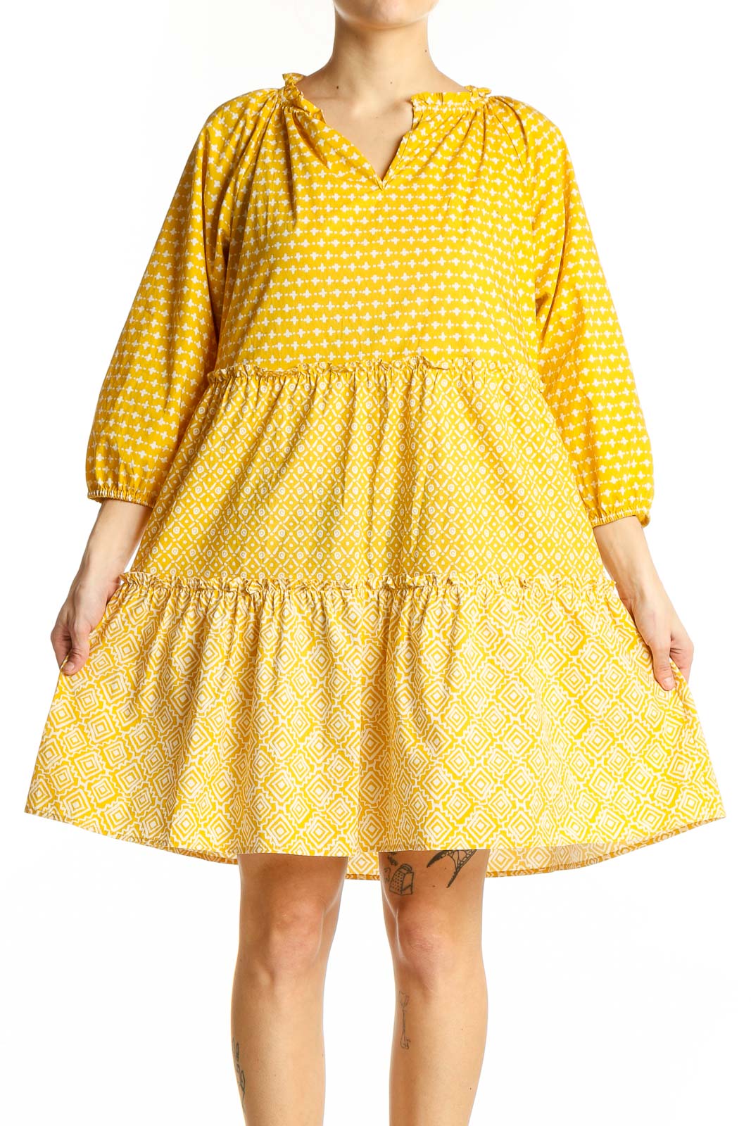 Front view of LOFT yellow polka dot tiered cotton dress with tie neckline