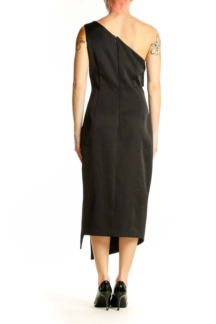 Side view of Keepsake black one-shoulder asymmetric midi dress with side slit