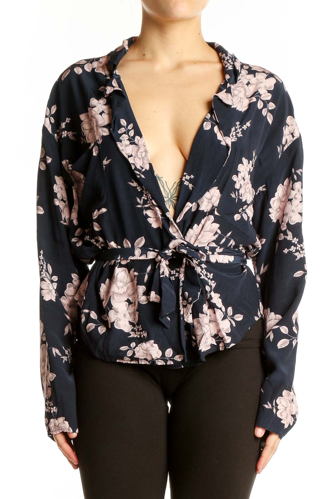 Front view of Marissa Webb navy floral wrap blouse with V-neck and tie-waist