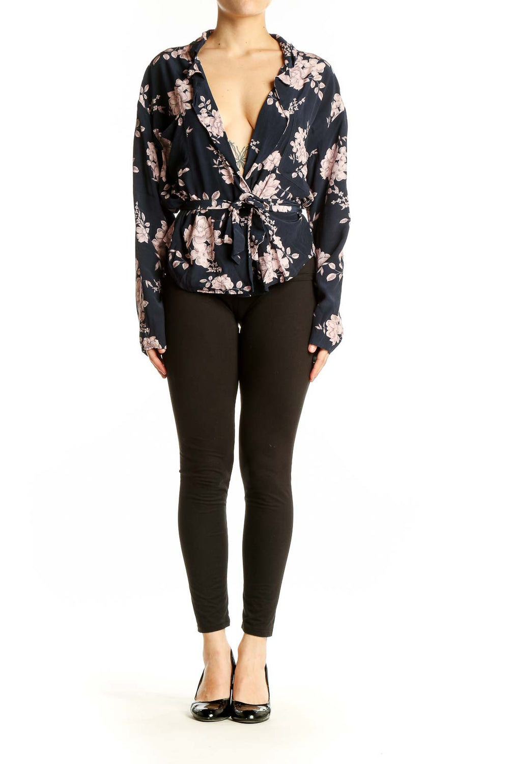 Front view of Marissa Webb navy floral wrap blouse with V-neck and tie-waist
