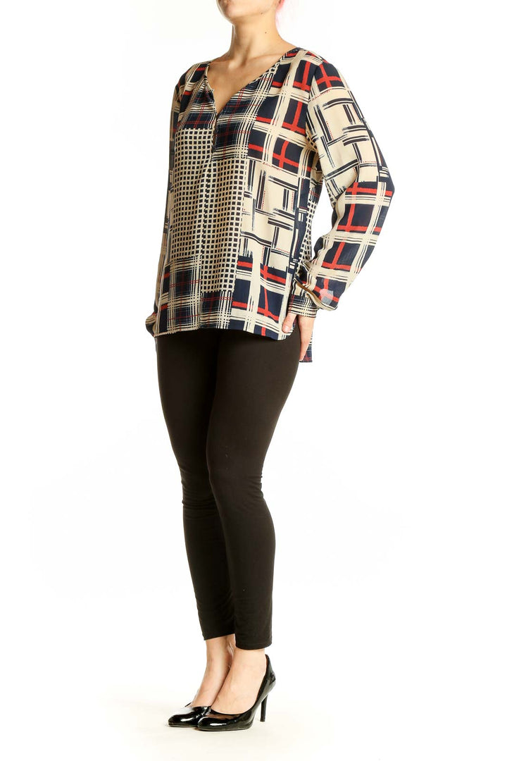 Front view of Sanctuary navy geometric print long sleeve blouse