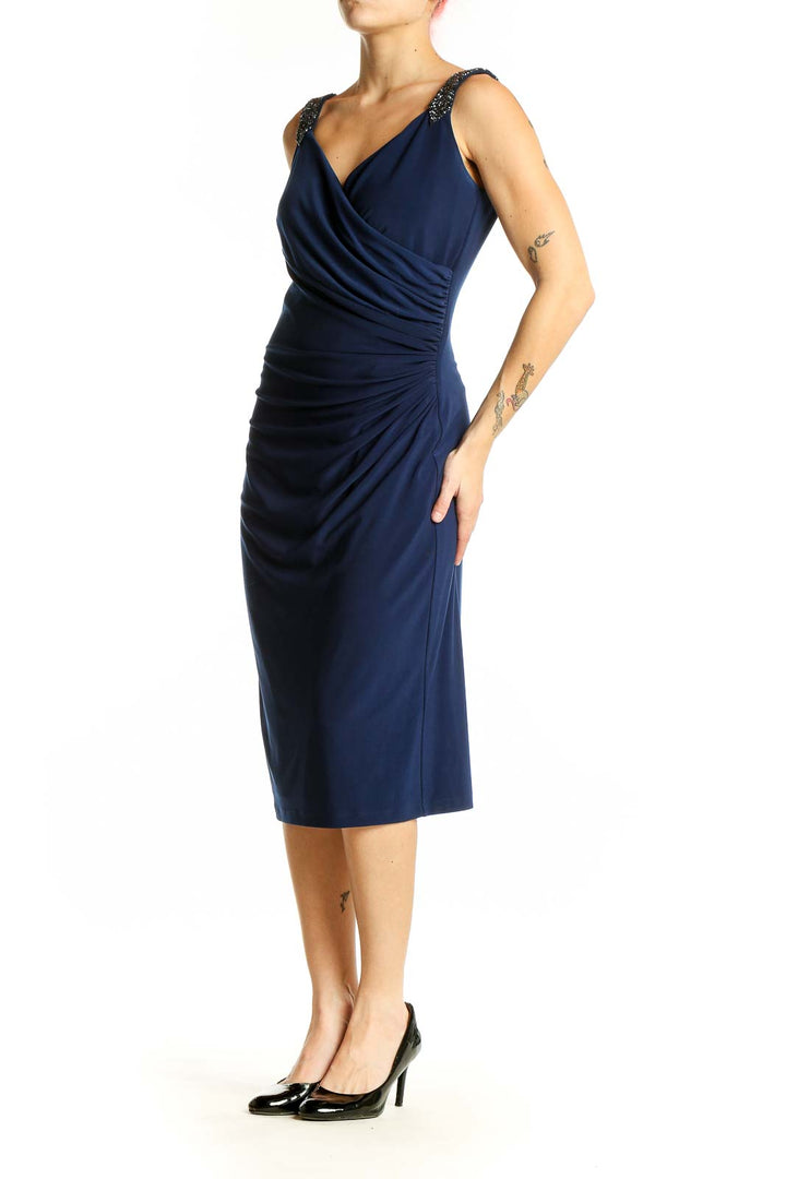 Front view of navy Lauren Ralph Lauren cocktail dress with ruched detailing and beaded straps