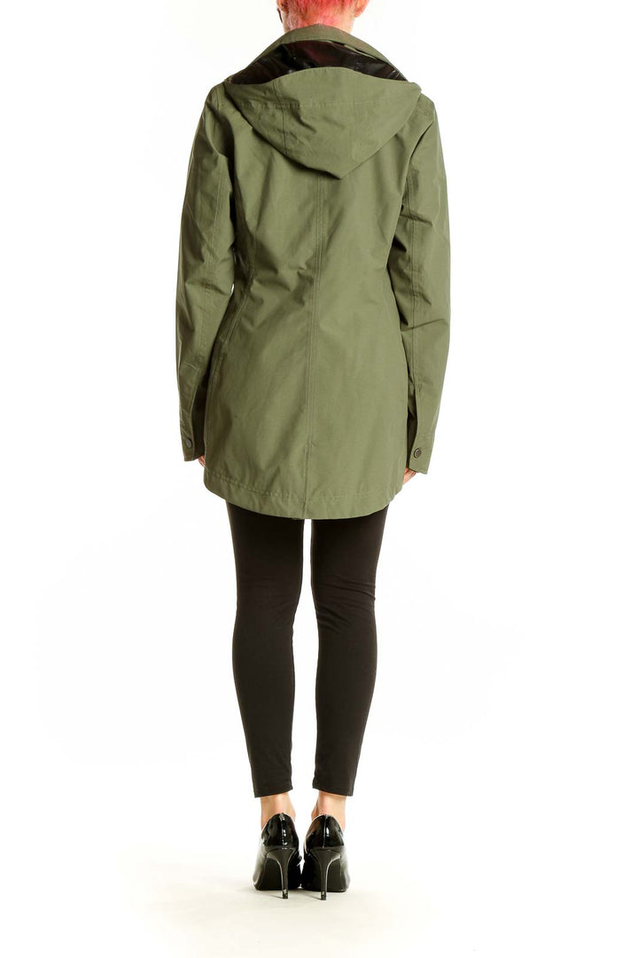 Back view of olive Marmot waterproof jacket showing length and fit