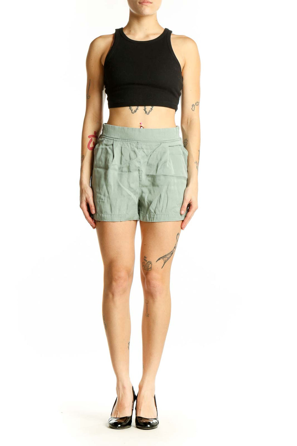 Front view of sage green pleated Lyocell shorts by Threads 4 Thought