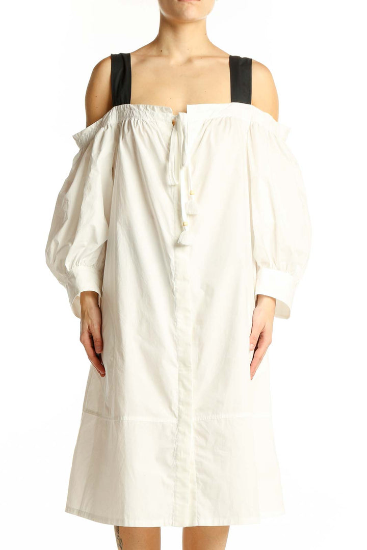 Front view of white off-shoulder cotton midi dress with black straps