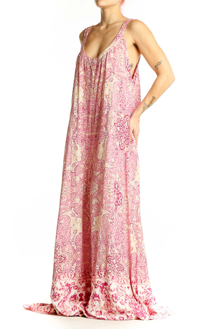 Front view of Free People pink floral paisley maxi jumpsuit with scoop neckline