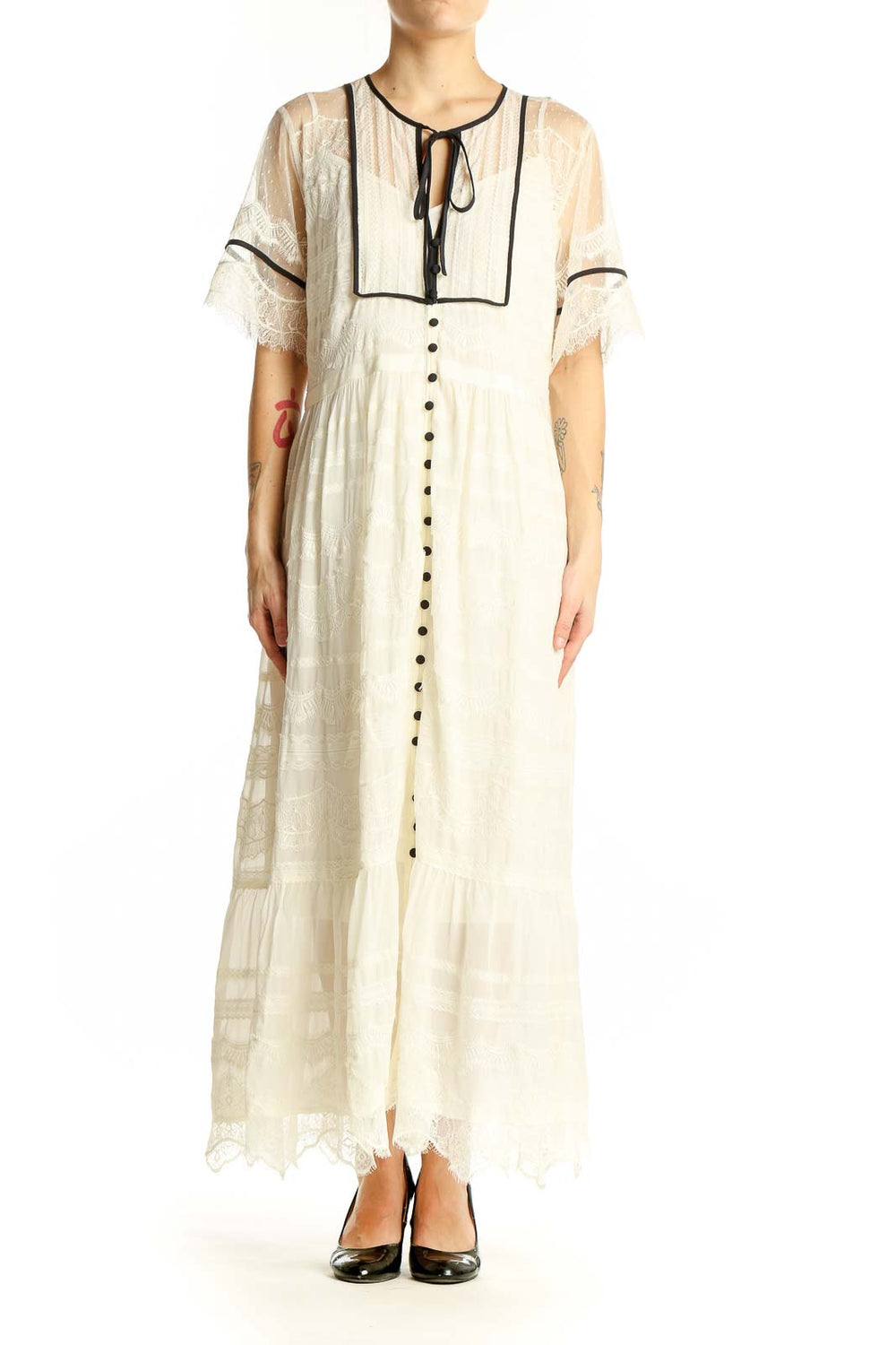 Front view of ivory lace-trimmed maxi dress from Anthropologie