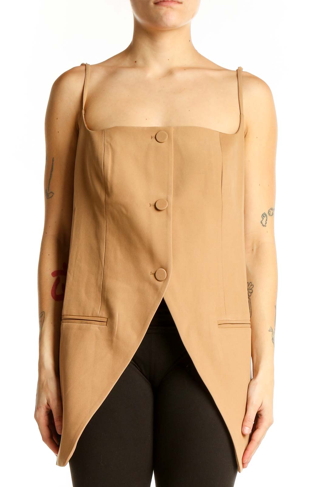 Front view of tan button-front sleeveless top with asymmetrical hemline