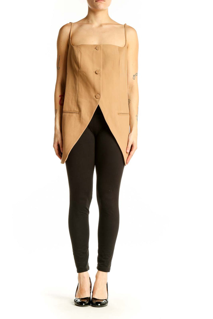Front view of tan button-front sleeveless top with asymmetrical hemline
