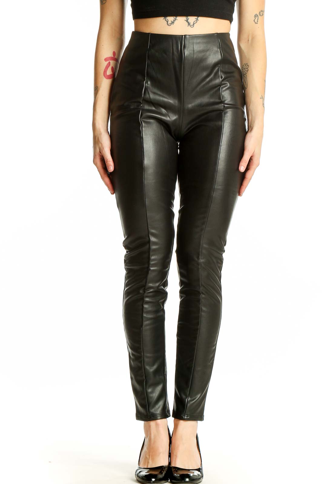 Front view of Haute Monde black faux leather high-waisted skinny pants