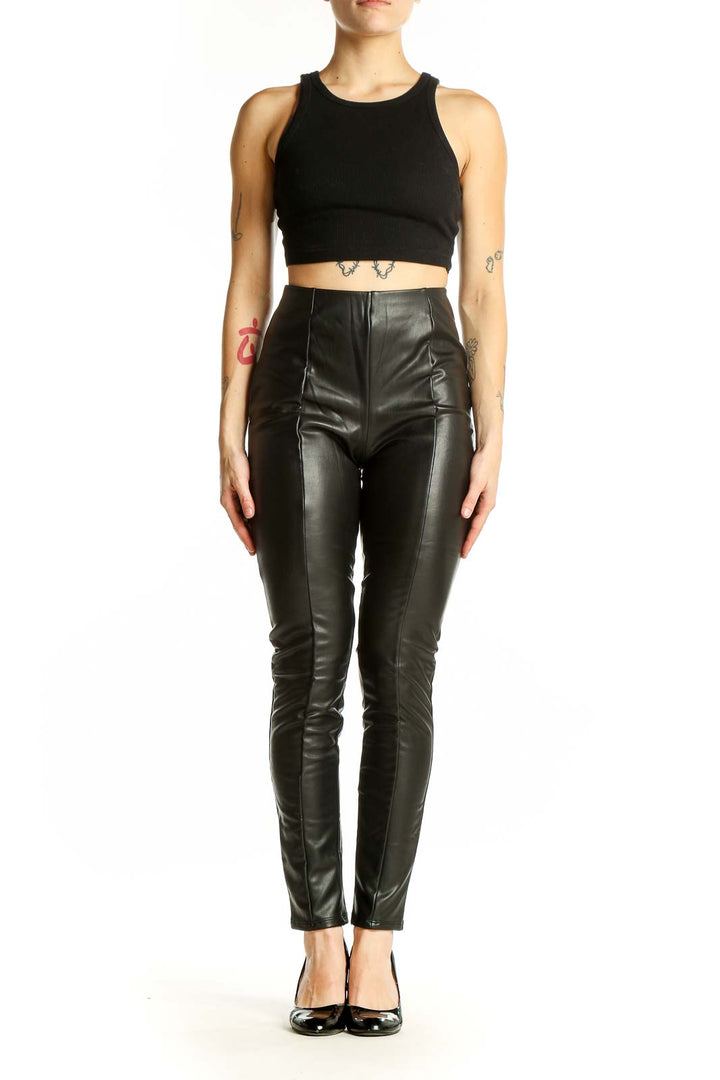 Front view of Haute Monde black faux leather high-waisted skinny pants