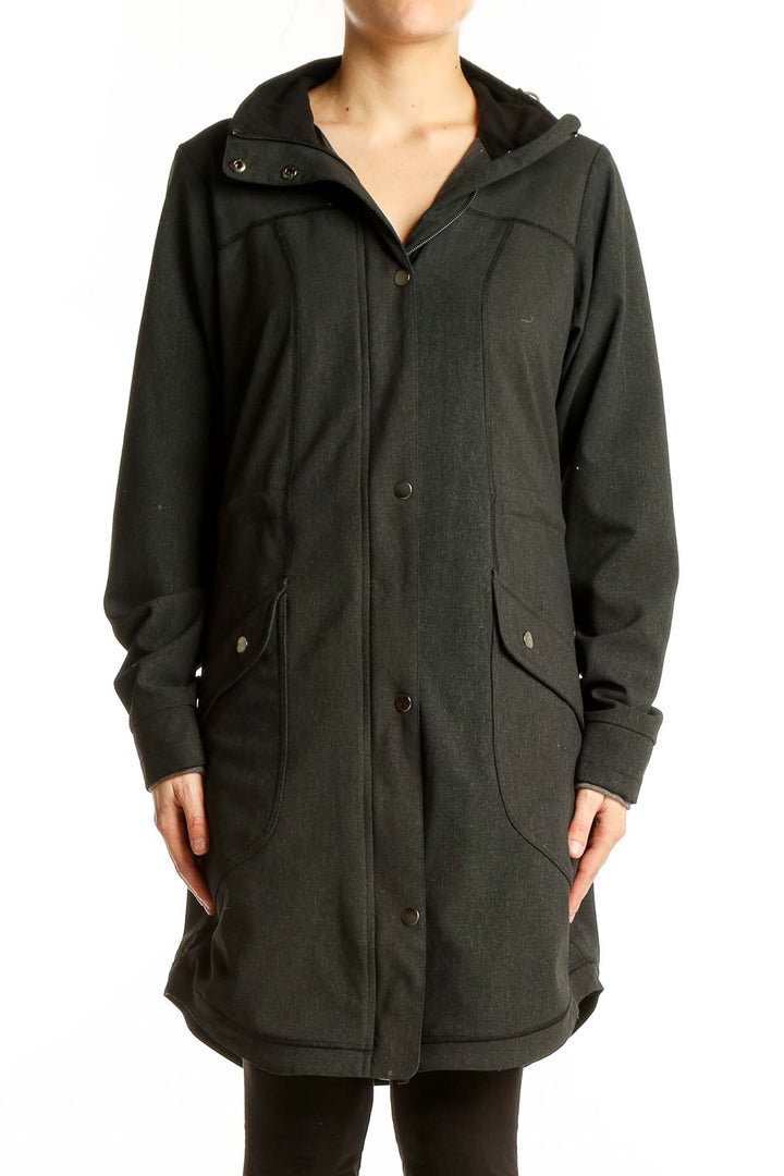 Front view of Exofficio dark green hooded parka with button closure