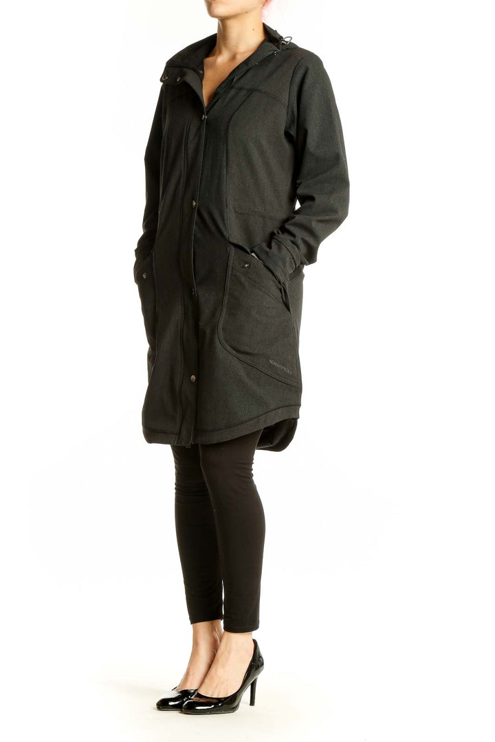 Front view of Exofficio dark green hooded parka with button closure
