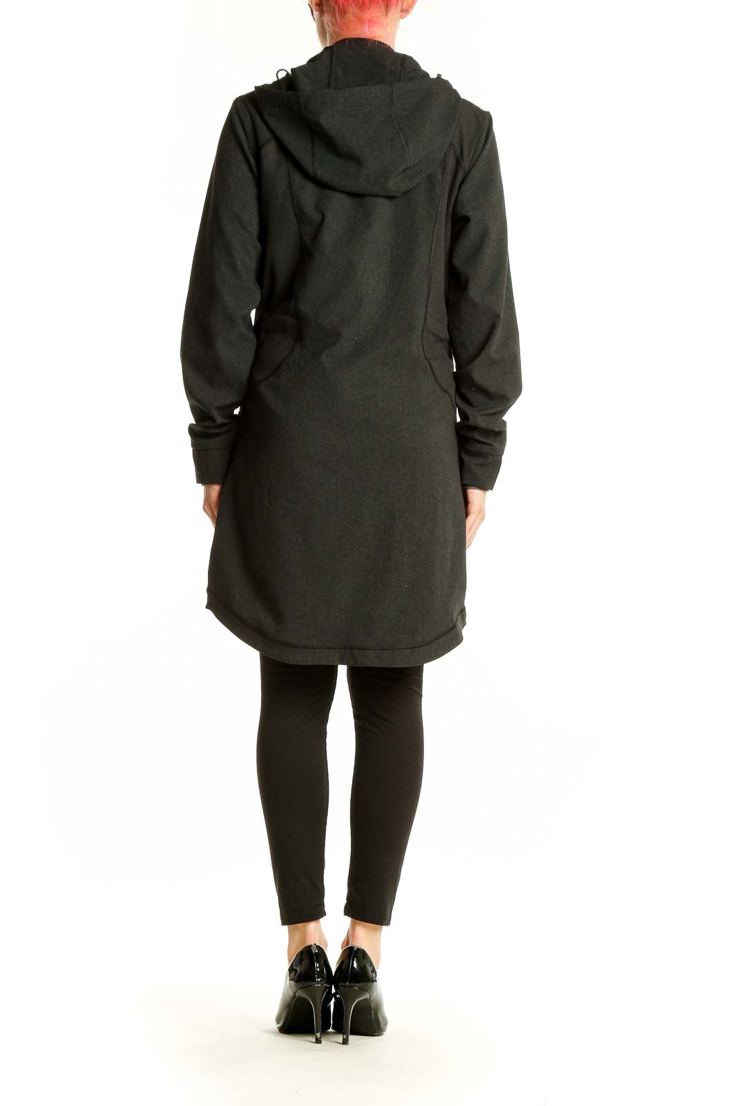 Back view of Exofficio dark green full-length parka on model